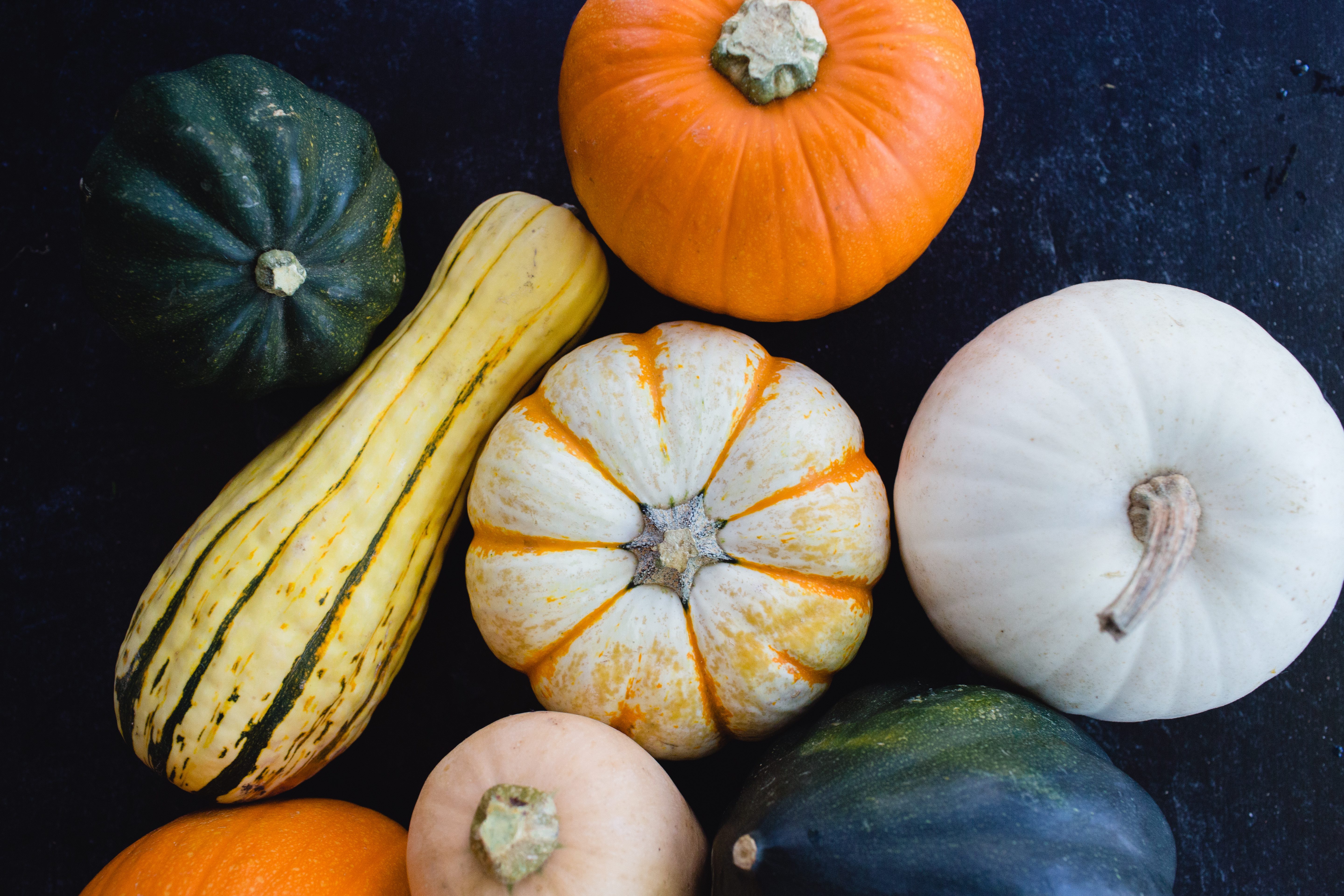 various sliced squash on a cutting board 