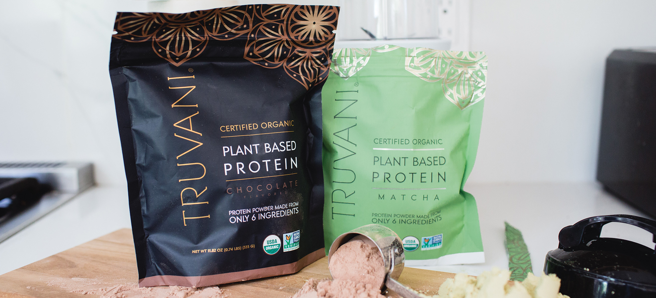 plant-based protein powders on kitchen counter 